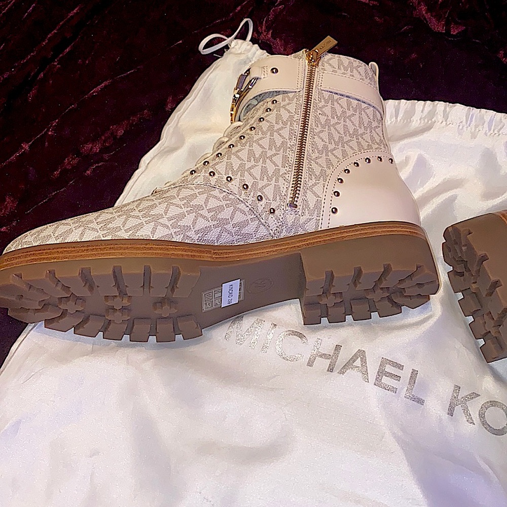 Michael kors boots. (size 10 women, 8.5 men) (brand new condition).